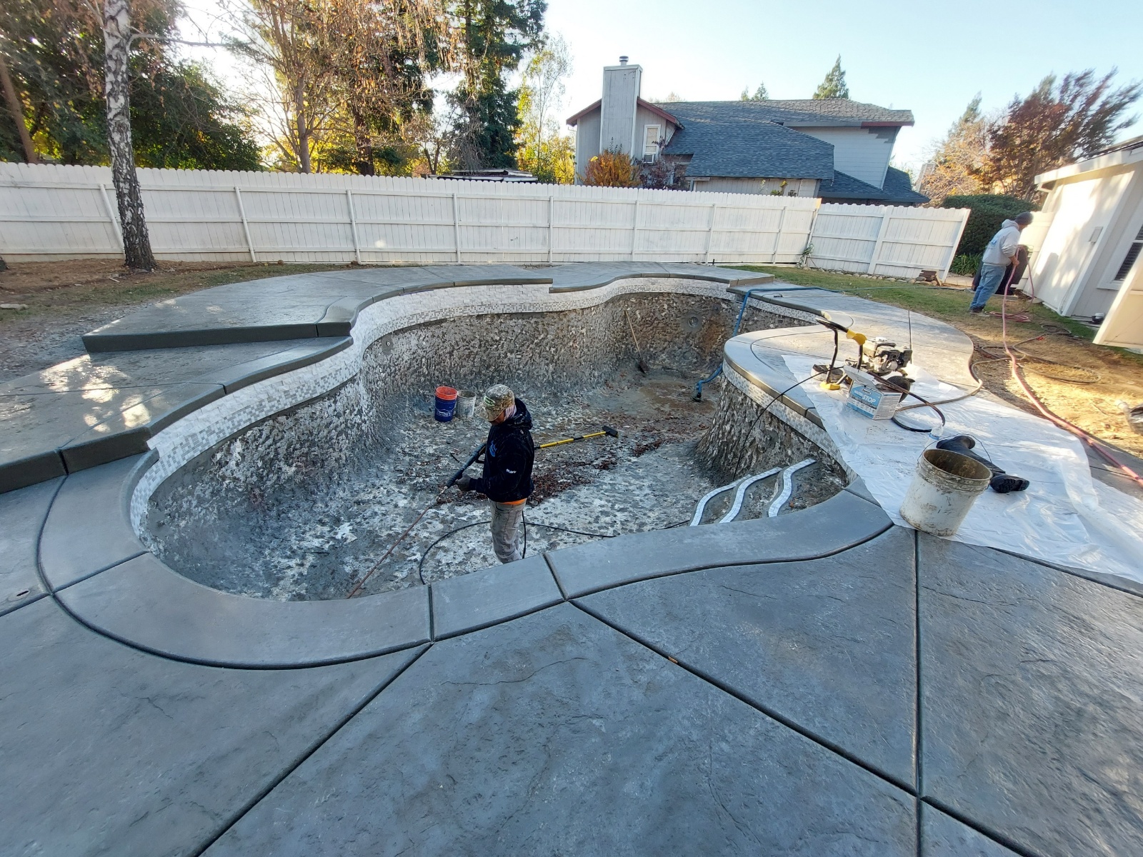 Pool plastering process during Sacramento remodel project