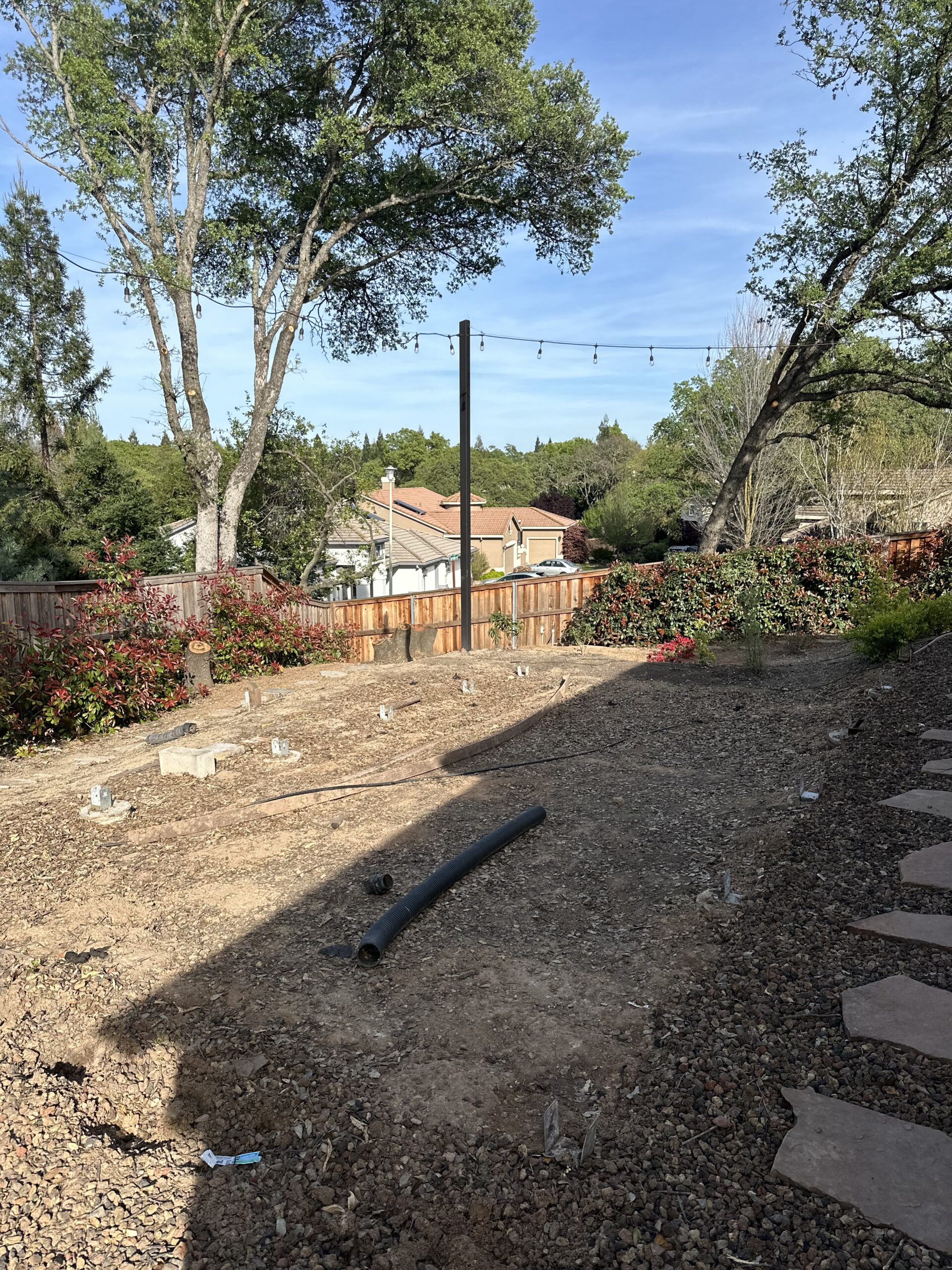 Modern backyard swimming pool for article about pool construction in Sacramento