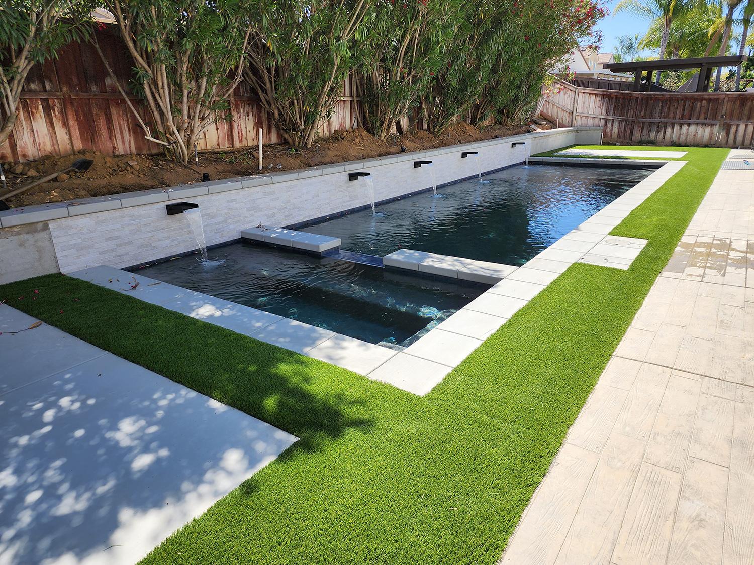Custom backyard swimming pool design by Sacramento Pool Pros for a Sacramento-area home