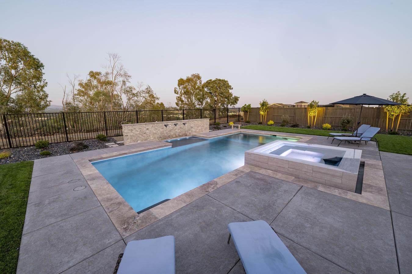 Custom backyard swimming pool project by Sacramento Pool Pros for a Sacramento-area home