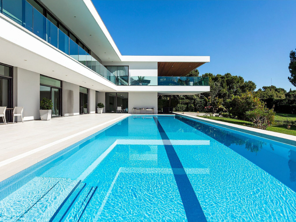 Luxury home swimming pool with custom backyard design