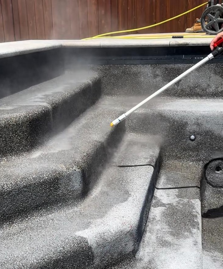 Pool plaster finish being detailed before pool refill