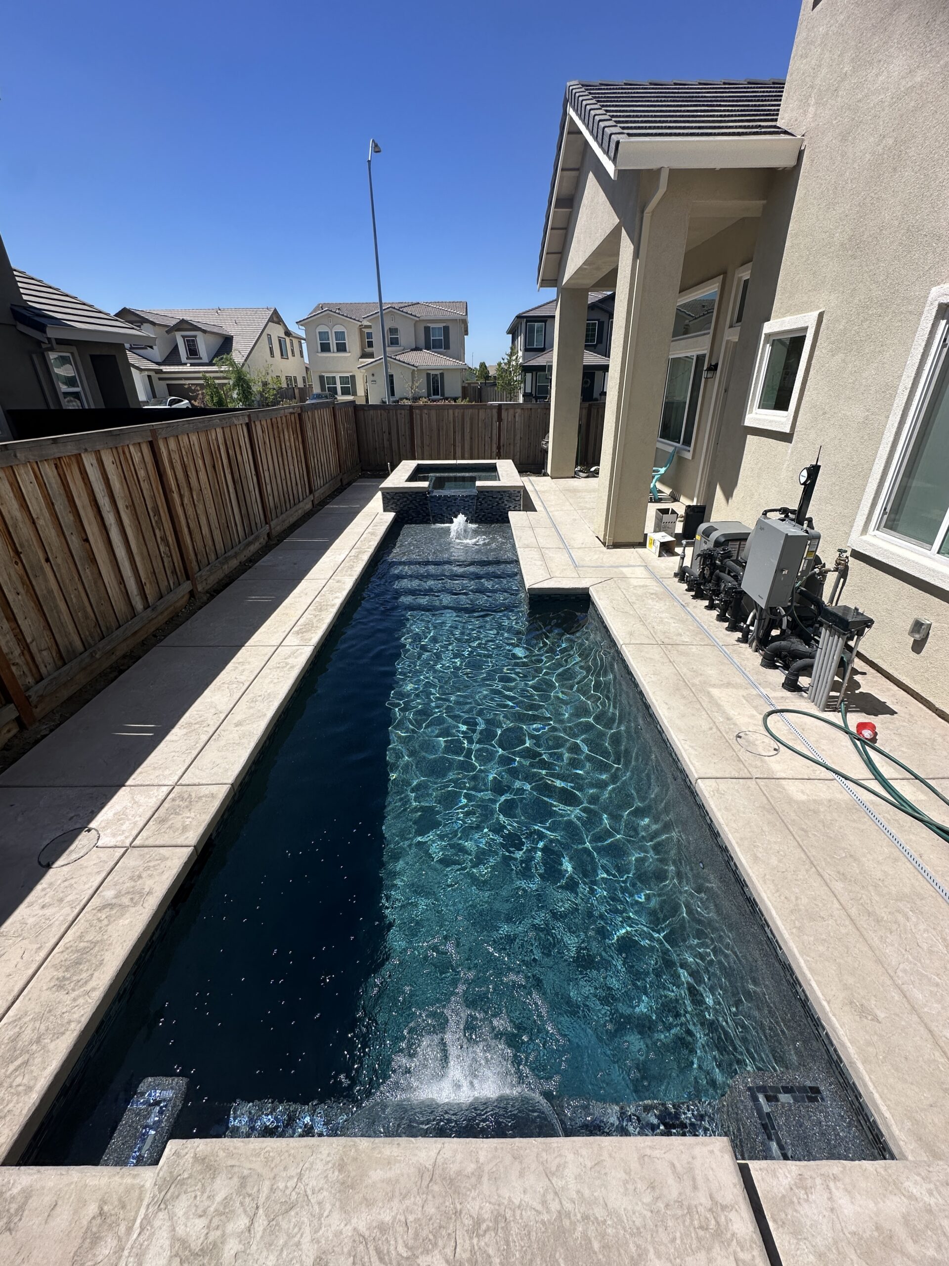 Backyard swimming pool project for Roseville swimming pool builder article