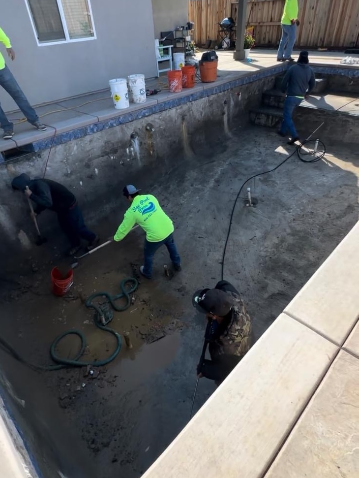 Old pool plaster chip out and surface preparation