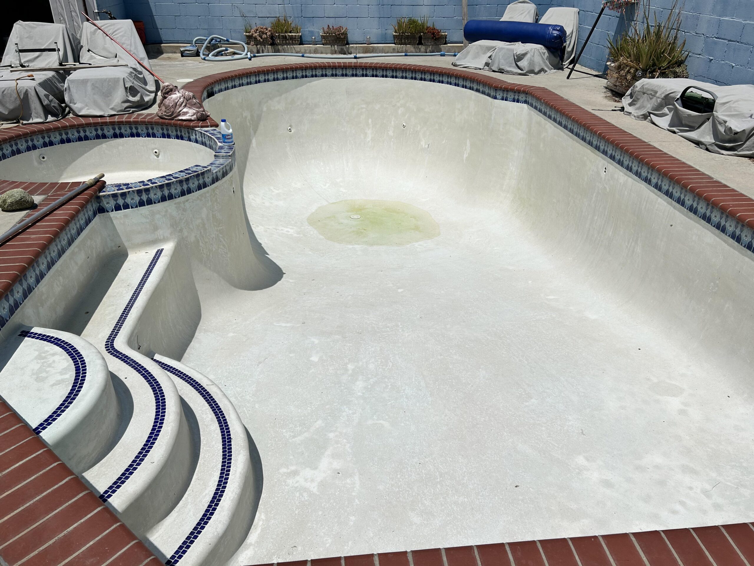 Swimming pool surface preparation before plastering and remodeling